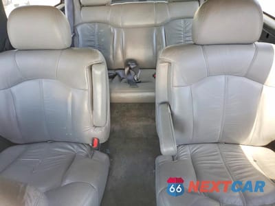 Zdjęcie 10 z 13 samochodu: 2001 CHEVROLET SUBURBAN K1500 VIN:1GNFK16T31J229268 - miniatura