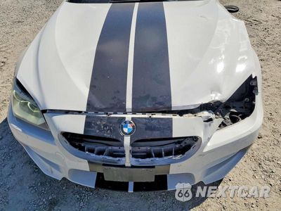 Zdjęcie 11 z 13 samochodu: 2014 BMW M6 VIN:WBSLZ9C56EDZ78798 - miniatura