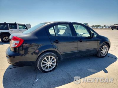 Trzecie zdjęcie samochodu z tyłu: 2011 SUZUKI SX4 LE VIN:JS2YC5A21B6303012 - miniatura