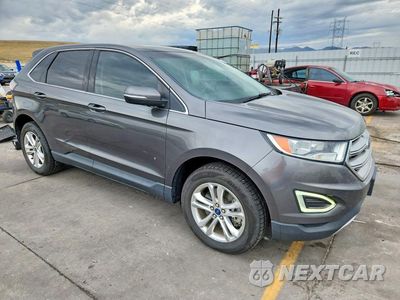 Czwarte zdjęcie samochodu z boku: 2015 FORD EDGE SEL VIN:2FMTK4J82FBC21122 - miniatura