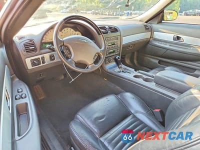 Zdjęcie 8 z 13 samochodu: 2002 FORD THUNDERBIRD VIN:1FAHP60AX2Y120294 - miniatura