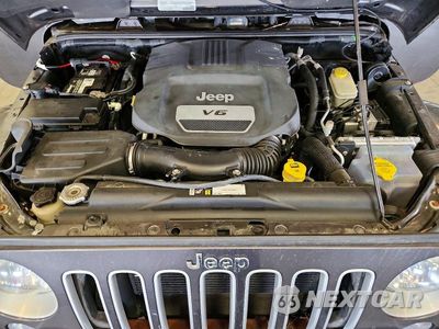 Zdjęcie 12 z 13 samochodu: 2016 JEEP WRANGLER SAHARA VIN:1C4AJWBG0GL167580 - miniatura