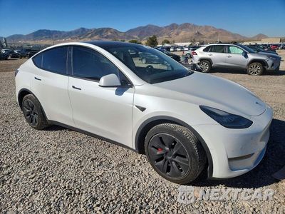 Czwarte zdjęcie samochodu z boku: 2021 TESLA MODEL Y VIN:5YJYGDEE9MF076057 - miniatura