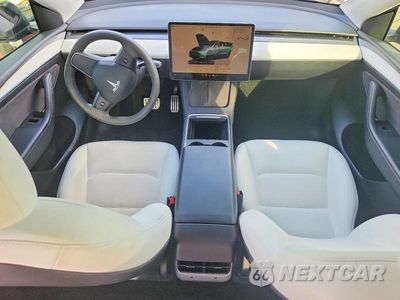 Zdjęcie 8 z 12 samochodu: 2023 TESLA MODEL Y VIN:7SAYGDEF5PF739432 - miniatura