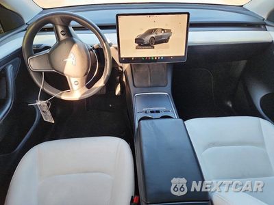 Zdjęcie 8 z 13 samochodu: 2023 TESLA MODEL Y VIN:7SAYGDEE6PF871283 - miniatura