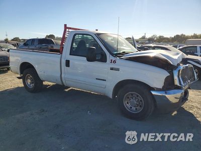 Czwarte zdjęcie samochodu z boku: 2001 FORD F350 SRW SUPER DUTY VIN:1FTSF30FX1EB34239 - miniatura