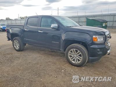Czwarte zdjęcie samochodu z boku: 2018 GMC CANYON SLT VIN:1GTG6DEN8J1131973 - miniatura