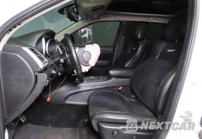 Zdjęcie 9 z 10 samochodu: 2013 JEEP GRAND CHEROKEE SRT-8 VIN:1C4RJFDJ4DC563714 - miniatura