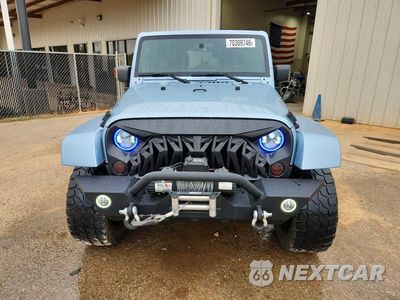 Piąte zdjęcie samochodu w środku: 2012 JEEP WRANGLER UNLIMITED SAHARA VIN:1C4BJWEG6CL148655 - miniatura