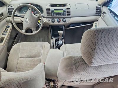 Zdjęcie 8 z 12 samochodu: 2004 TOYOTA CAMRY LE VIN:4T1BE32K24U851303 - miniatura