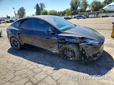 Czwarte zdjęcie samochodu z boku: 2021 TESLA MODEL Y VIN:5YJYGDEE3MF180236 - miniatura