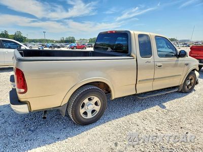 Trzecie zdjęcie samochodu z tyłu: 1999 FORD F150 VIN:1FTRX17W8XKB62749 - miniatura