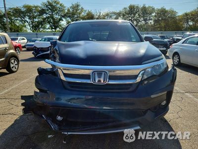 Piąte zdjęcie samochodu w środku: 2019 HONDA PILOT EX VIN:5FNYF6H33KB068137 - miniatura