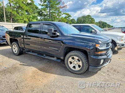 Czwarte zdjęcie samochodu z boku: 2016 CHEVROLET SILVERADO K1500 LT VIN:3GCUKREC3GG265603 - miniatura