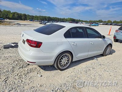Trzecie zdjęcie samochodu z tyłu: 2017 VOLKSWAGEN JETTA S VIN:3VW2B7AJ2HM242281 - miniatura