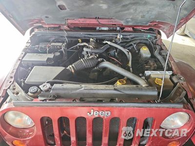 Zdjęcie 11 z 12 samochodu: 2008 JEEP WRANGLER UNLIMITED SAHARA VIN:1J4GA59188L531438 - miniatura