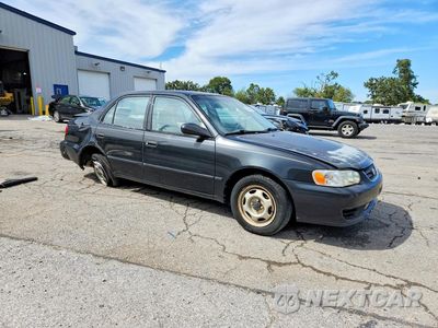 Czwarte zdjęcie samochodu z boku: 2002 TOYOTA COROLLA CE VIN:1NXBR12E62Z564658 - miniatura