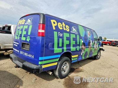 Trzecie zdjęcie samochodu z tyłu: 2014 CHEVROLET EXPRESS G2500 VIN:1GCWGGCA1E1149828 - miniatura