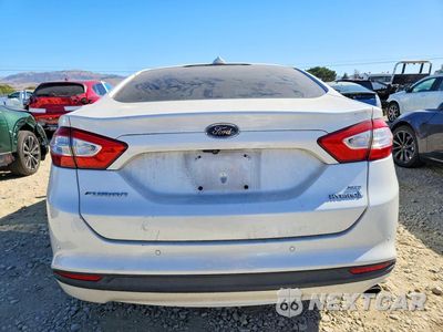 Zdjęcie 6 z 12 samochodu: 2013 FORD FUSION SE HYBRID VIN:3FA6P0LU9DR371626 - miniatura