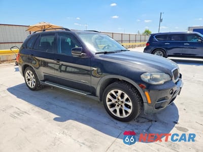 Czwarte zdjęcie samochodu z boku: 2013 BMW X5 XDRIVE35I VIN:5UXZV4C58D0B22474 - miniatura