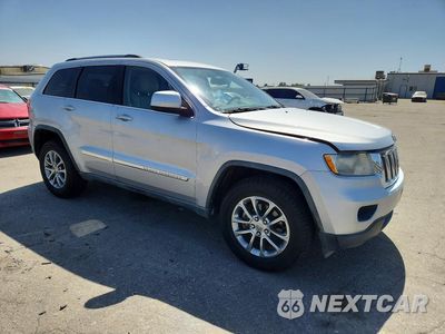 Czwarte zdjęcie samochodu z boku: 2015 JEEP GRAND CHEROKEE OVERLAND VIN:1J4RR4GT8BC529065 - miniatura