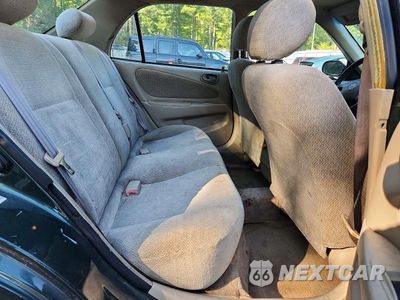 Zdjęcie 10 z 12 samochodu: 2001 TOYOTA COROLLA LE VIN:2T1BR12E21C499050 - miniatura