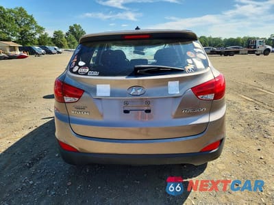 Zdjęcie 6 z 12 samochodu: 2010 HYUNDAI TUCSON GLS VIN:KM8JT3AC8AU083205 - miniatura