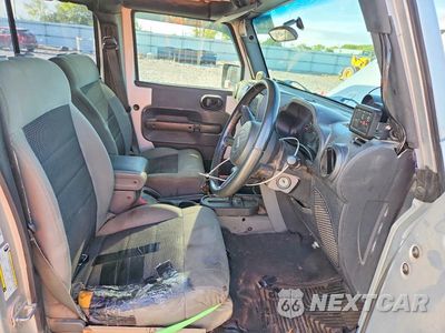 Zdjęcie 7 z 12 samochodu: 2009 JEEP WRANGLER UNLIMITED X VIN:1J4GZ39139L710551 - miniatura