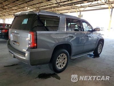 Trzecie zdjęcie samochodu z tyłu: 2018 GMC YUKON SLE VIN:1GKS1AKC6JR368624 - miniatura