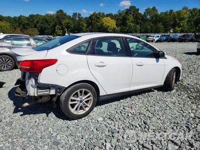 Trzecie zdjęcie samochodu z tyłu: 2017 FORD FOCUS SE VIN:1FADP3F26HL322472 - miniatura