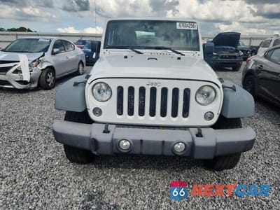 Piąte zdjęcie samochodu w środku: 2016 JEEP WRANGLER SPORT VIN:1C4AJWAG0GL119465 - miniatura