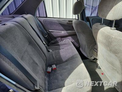 Zdjęcie 11 z 14 samochodu: 1999 TOYOTA COROLLA VE VIN:1NXBR12EXXZ266539 - miniatura