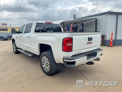 Trzecie zdjęcie samochodu z tyłu: 2015 GMC SIERRA K2500 DENALI VIN:1GT120E85FF601018 - miniatura