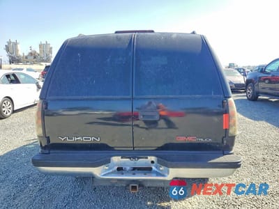 Zdjęcie 6 z 13 samochodu: 1997 GMC YUKON VIN:1GKEK13R7VJ700085 - miniatura