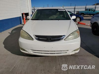 Piąte zdjęcie samochodu w środku: 2004 TOYOTA CAMRY LE VIN:JTDBE32K440265374 - miniatura