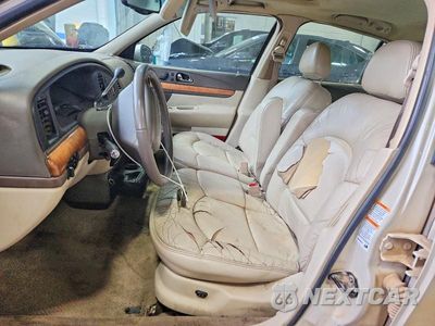 Zdjęcie 7 z 12 samochodu: 2002 LINCOLN CONTINENTAL VIN:1LNHM97V92Y697536 - miniatura