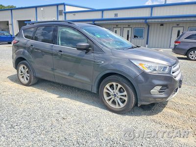 Czwarte zdjęcie samochodu z boku: 2017 FORD ESCAPE SE VIN:1FMCU0GD3HUE05022 - miniatura