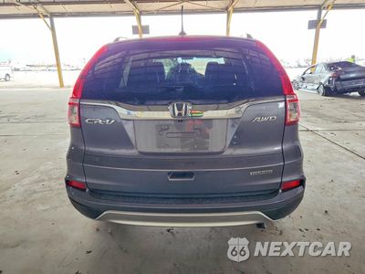 Zdjęcie 6 z 14 samochodu: 2016 HONDA CR-V TOURING VIN:5J6RM4H9XGL009376 - miniatura