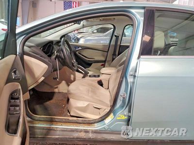 Zdjęcie 12 z 13 samochodu: 2012 FORD FOCUS SEL VIN:1FAHP3M26CL238939 - miniatura