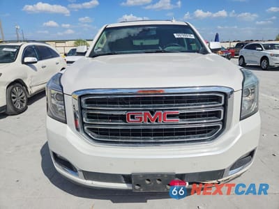 Piąte zdjęcie samochodu w środku: 2017 GMC YUKON SLT VIN:1GKS1BKC7HR356465 - miniatura