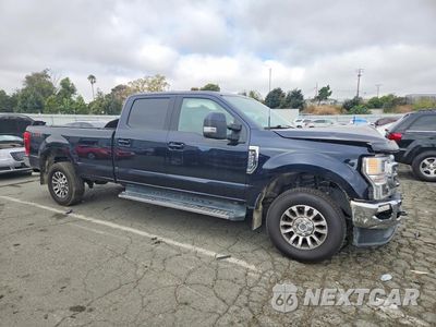 Czwarte zdjęcie samochodu z boku: 2021 FORD F250 SUPER DUTY VIN:1FT7W2B67MED97371 - miniatura