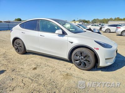 Czwarte zdjęcie samochodu z boku: 2025 TESLA MODEL Y VIN:7SAYGAEE0SF249043 - miniatura