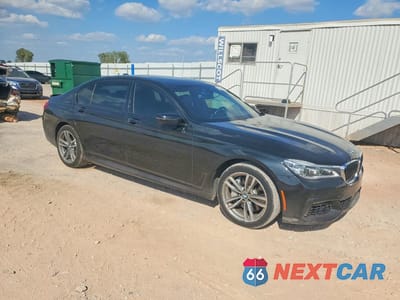 Czwarte zdjęcie samochodu z boku: 2017 BMW 750 XI VIN:WBA7F2C54HG422059 - miniatura