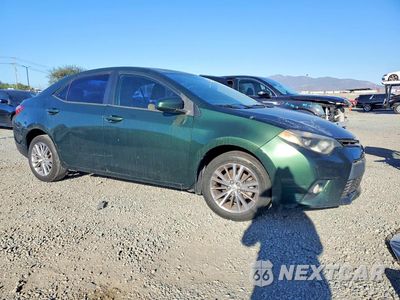 Czwarte zdjęcie samochodu z boku: 2014 TOYOTA COROLLA LE PLUS VIN:5YFBURHE6EP005086 - miniatura