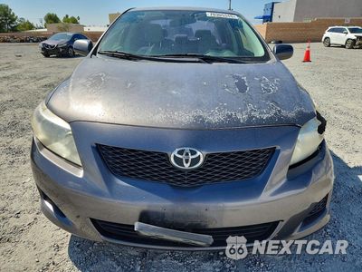 Piąte zdjęcie samochodu w środku: 2010 TOYOTA COROLLA LE VIN:JTDBU4EE4AJ076227 - miniatura