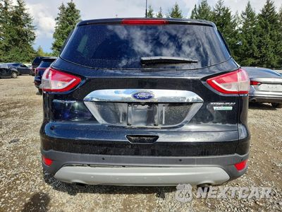 Zdjęcie 6 z 13 samochodu: 2014 FORD ESCAPE TITANIUM VIN:1FMCU0J90EUE40827 - miniatura