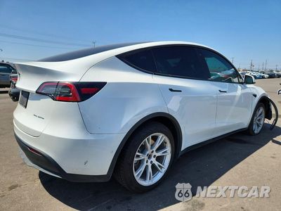 Trzecie zdjęcie samochodu z tyłu: 2022 TESLA MODEL Y VIN:7SAYGDEE9NF427229 - miniatura