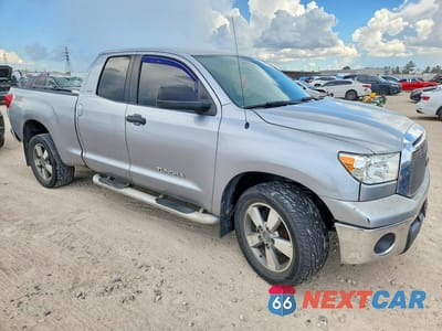 Czwarte zdjęcie samochodu z boku: 2011 TOYOTA TUNDRA DOUBLE CAB SR5 VIN:5TFRM5F19BX023215 - miniatura