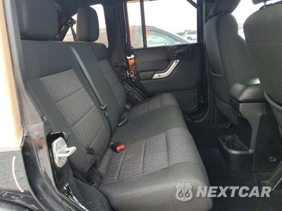 Zdjęcie 10 z 12 samochodu: 2012 JEEP WRANGLER UNLIMITED SAHARA VIN:1C4HJWEG8CL104473 - miniatura