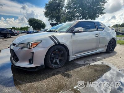 2014 SCION TC 10 SERIES JTKJF5C70E3066653 - główne zdjęcie licytacji z USA - miniatura